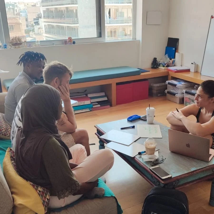 Students in the middle of a Greek Workshop